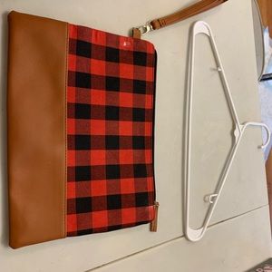 Buffalo plaid clutch/bag. Clothes hanger in pic to ref size. New no tags